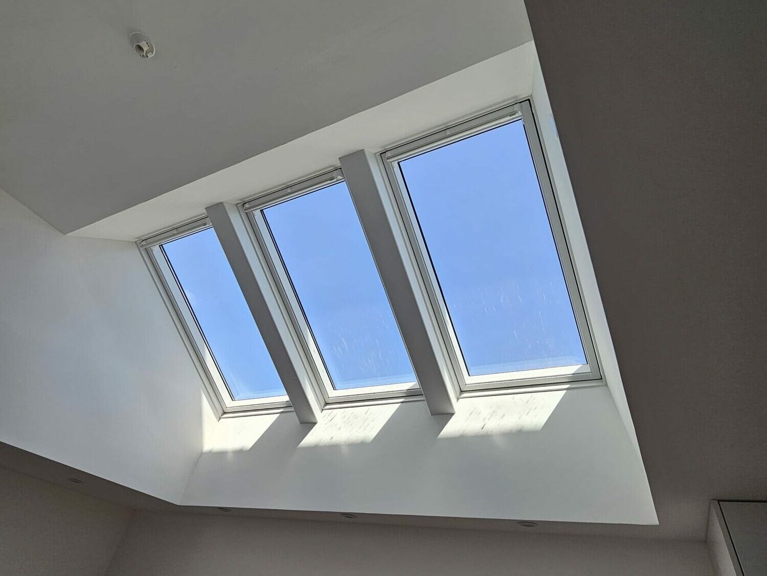 Installation d'un Velux Trio pour une maison à Amfreville